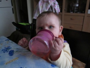 learning to use a sippy cup